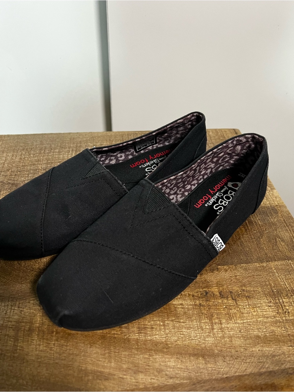 BOBS from Skechers Black Slip-On Canvas Loafers with Leopard-Print Lining